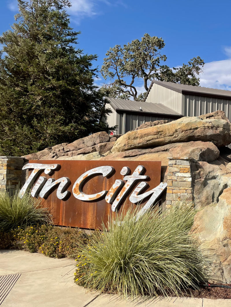Tin City entry sign